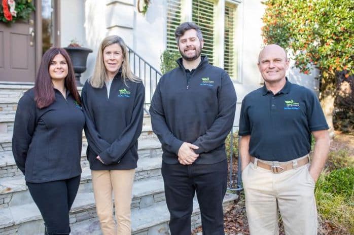 Mold Remediation Franchise Opportunity photo showing four current business owners in their company shirts