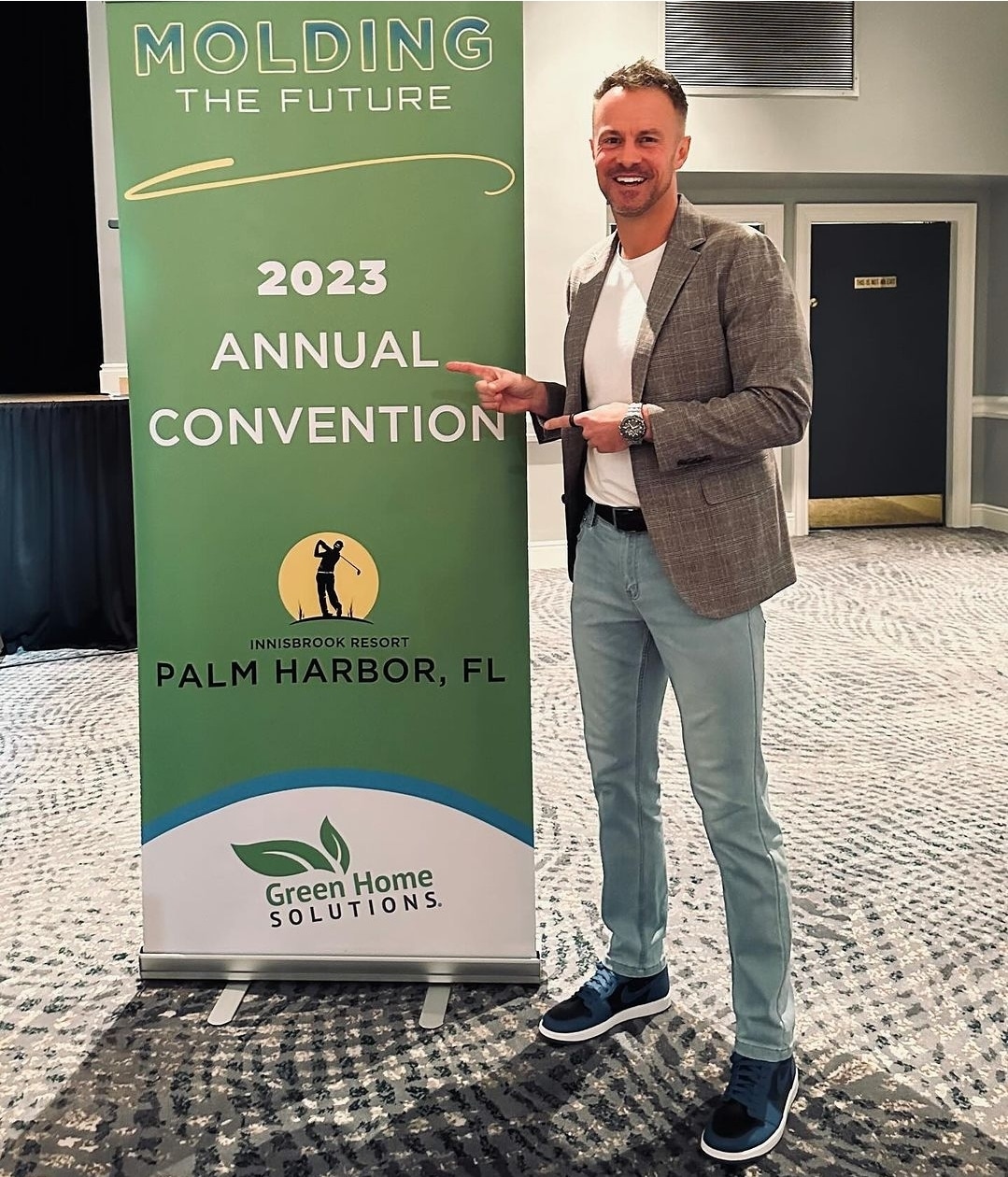 2023 Green Home Solutions Annual Convention with signage and keynote speaker